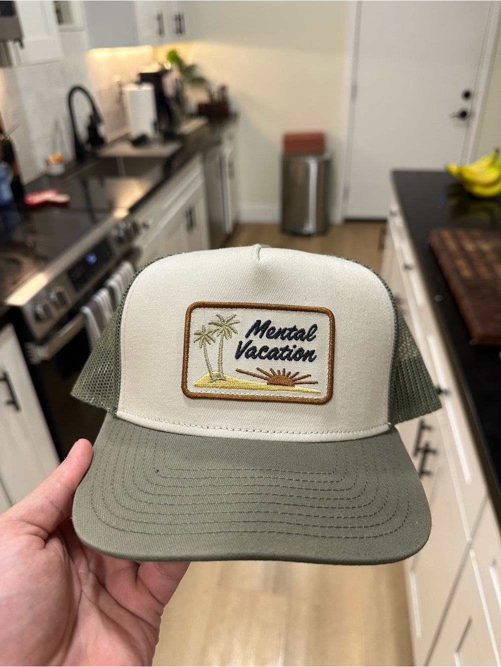 Katin 'Mental Vacation' Trucker Hat in Olive Green and Cream
